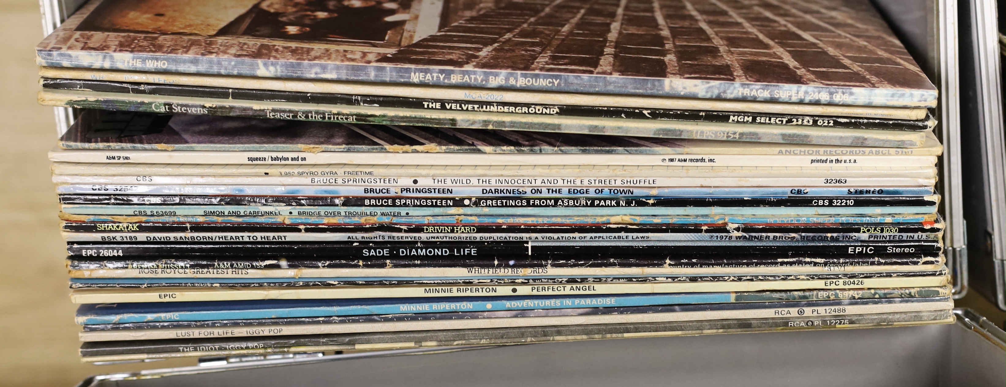Forty-eight mainly 1970's-80's LPs contained within two LP flight cases, including The Police, Van Morrison, Rickie Lee Jones, Elton John, Neil Young, The Who, The Velvet Underground, Bruce Springsteen, Iggy Pop, etc.